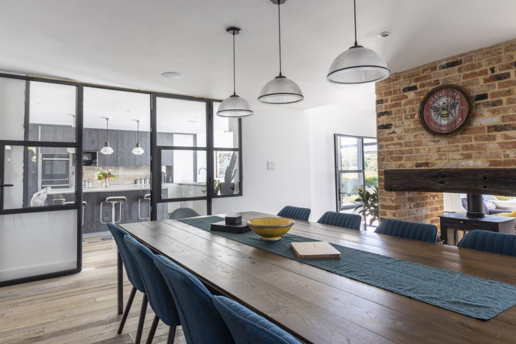 Open Plan Kitchen and Dining Area with sliding doors